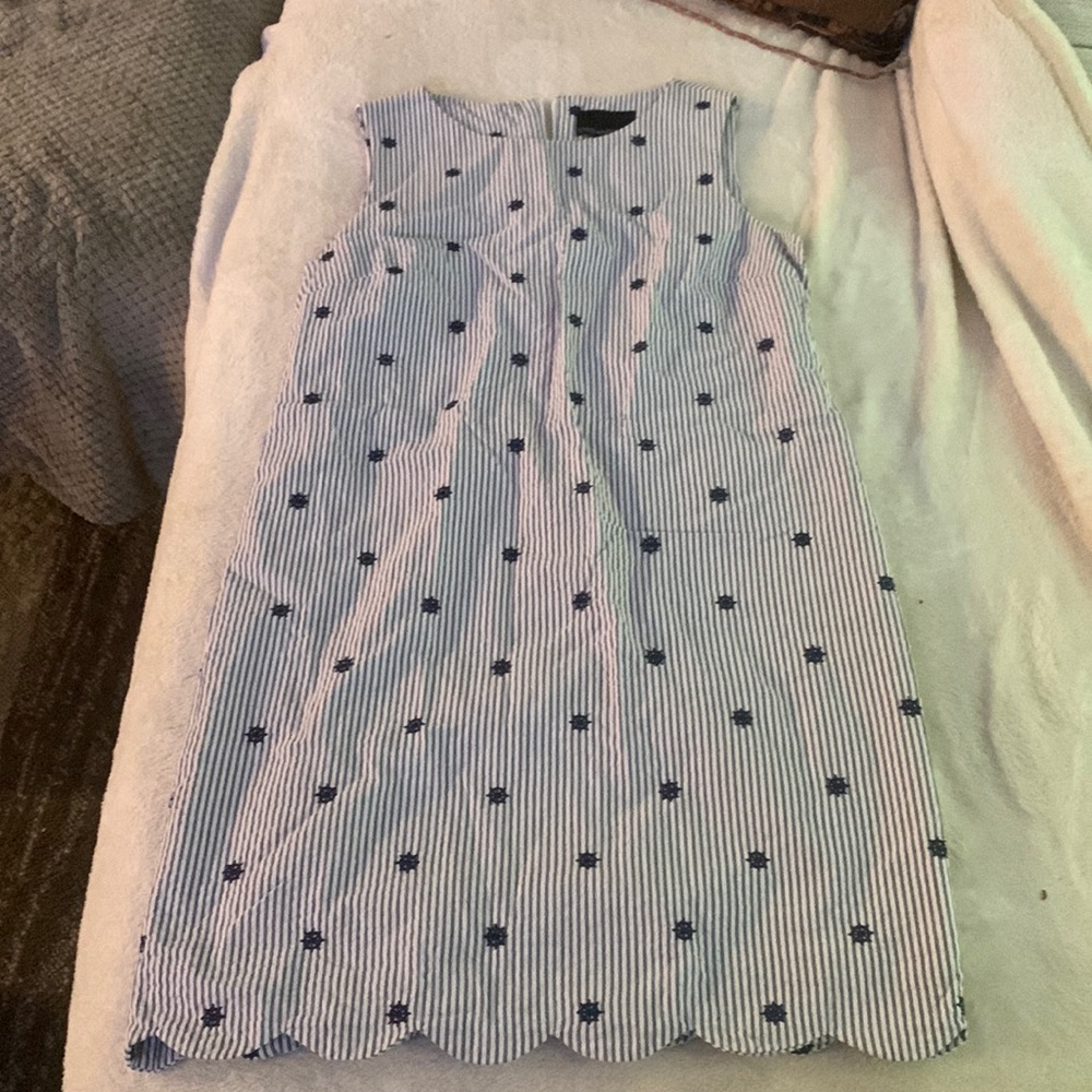 scalloped dress with sailing wheel